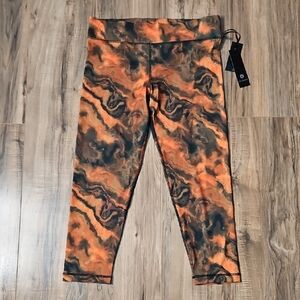 Velocity Orange and Black Patterned Leggings NWT